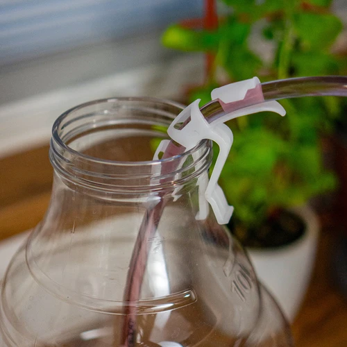 Universāls šļūteņu turētājs, Ø maks. 14 mm - 4